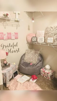 a room filled with lots of furniture and decor on shelves next to a wall that says grateful heart