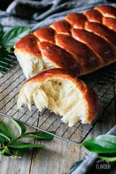 a loaf of bread sitting on top of a cooling rack