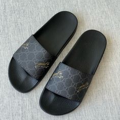 Gucci Men's Gg Supreme Tiger Slide Sandals, New In Box. Size 7. Molded Footbed For Optimal Comfort Slip On Classic Gg Supreme Canvas Upper With Tiger Motif Canvas Upper And Lining, Rubber Sole Made In Italy Luxury Gucci Slip-on Slides, Luxury Black Cushioned Slides, Designer Black Slides With Cushioned Footbed, Luxury Black Flat Slides, Black Luxury Flat Slides, Gucci Black Slides With Cushioned Footbed, Gucci Black Leather Slides, Black Leather Gucci Slides, Gucci Black Slip-on Sandals