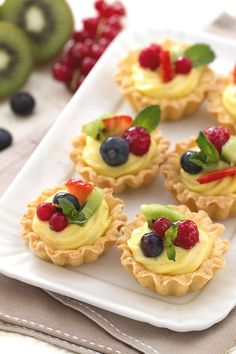 small fruit tarts on a plate ready to be eaten