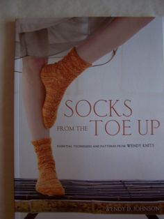 the book socks from the toe up is on display