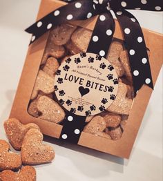 a box filled with heart shaped dog treats