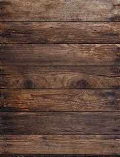 an old wooden wall with planks and nails