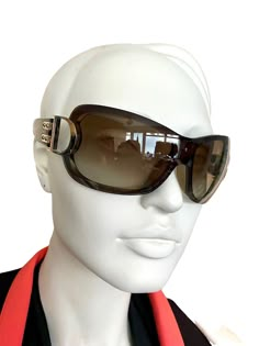 Dior Airspeed 2 shield sunglasses with khaki frames and faintly ombre grey lenses and silver tone side D hinge stamped Dior with nail heads. Pre-worn but in very good condition: Some faint wear but does not impede vision. May not come with original case. Made in Italy. Similar to model made famous by Kylie Jenner. Guaranteed authentic. Note: I have an identical pair in not as good condition that I can sell cheaper. DM me for info. + Vintage items are not new and might have minor imperfections + Luxury Vintage Silver Sunglasses, Designer Brown Shield Sunglasses With Gradient Lenses, Galliano Dior, Vintage Eye Glasses, Luxury Hats, Stylish Glasses, Dior Sunglasses, Shield Sunglasses, Authentic Jewelry