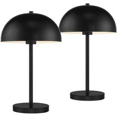 two black lamps sitting next to each other