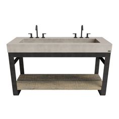 a concrete sink with two faucets on top