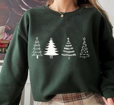 "Christmas Tree Sweatshirt, Merry & Bright Shirt, Christmas Shirts for Women, Christmas Crewneck pullover Sweater, cute Winter Holiday Tees Unisex Crewneck Sweatshirt. Loose fit for a comfortable feel. FABRICATION * 50% cotton, 50% polyester * Runs true to size SIZING This style is a Unisex Sweatshirt. If you are unsure about the size and the color you should order, please refer to the size and color chart in the pictures. CARE INSTRUCTIONS * Machine wash: warm (max 40C or 105F) * Tumble dry: lo Green Winter T-shirt, Holiday Long Sleeve Tops As Gifts, Holiday Long Sleeve Tops As A Gift, Winter Crew Neck Tops As Gifts, Casual Green Christmas Sweatshirt, Green Long Sleeve Holiday Top, Green Casual Christmas Sweater, Green Winter Sweatshirt For Gift, Green Winter Sweatshirt Gift