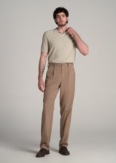 About Our Tall Men's Relaxed Tapered Pleated Trouser The Go-To Pants for Tall Men For the guy over 6' who values both style and comfort, these relaxed tapered pleated slacks for tall men are a game-changer. Designed specifically for the unique needs of tall guys, they offer a sophisticated look without sacrificing comfort. Embrace a modern style of men's tall pants that stands out in any setting.• Modern tapered fit• Versatile design for both casual and formal settings• Sustainably made with 68% Men Trouser Design, Relaxed Fit Pants Outfit Men, Outfit Ideas For Tall Guys, Formal Comfortable Outfit, Male Parisian Style, Men Trousers Style, Mens Closet Staples, Formal Pants For Men Style Classy, Mens Corporate Attire