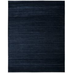 a dark blue rug on a white background