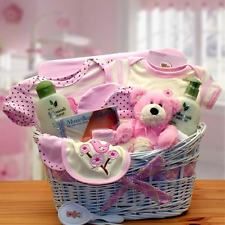 a baby's gift basket is shown on a table