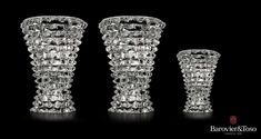 three crystal vases sitting next to each other on a black background with the words barock