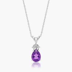 14K White Gold Pear Shaped Amethyst & Tri-Diamond Pendant Necklace. Channel your inner royal in this luxurious pendant necklace. Featuring a beautiful pear shaped gemstone with three diamonds at its top, this expertly crafted necklace exudes elegance. Pair it with the matching earrings for the ultimate shine. Fine Jewelry Purple Teardrop Pendant Necklace, Fine Jewelry Amethyst Teardrop Pendant Necklace, Purple Teardrop Pendant Fine Necklace, Purple Teardrop Fine Jewelry Necklace, Elegant Purple Pear-shaped Necklace, Purple Teardrop Pendant Necklace For Formal Occasions, Diamond Pendant Necklace, Fine Jewellery Necklace, Pear Shaped