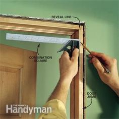 a person is working on the door frame