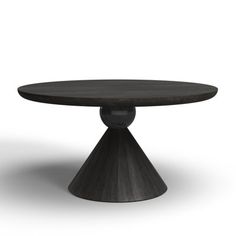 a round table with an iron base and black wood grained finish on the top