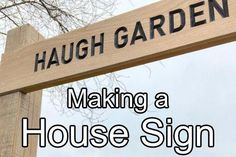 a wooden sign that says making a house sign with the words haugh garden on it