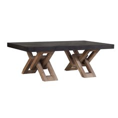 a wooden table with two intersecting legs and a black top, against a white background