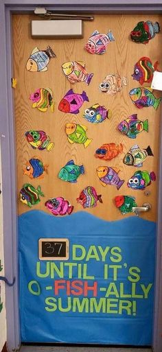 a door decorated with fish and saying days until it's c - fish - ally summer