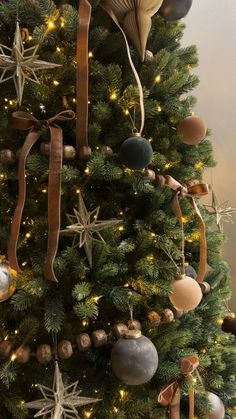 a christmas tree decorated with ornaments and lights