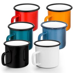 four different colored coffee mugs sitting next to each other on a white surface with black rim