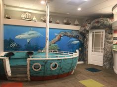 Under The Sea Office Theme, Aquarium Office Interior Design, Pediatric Dental Office Design Interiors, Pediatric Dental Clinic Interior, Library Ocean Theme, Pediatric Dental Office Design, Bubble World, Boat Bar, Pediatric Dental Office