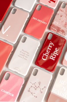 many cell phones are arranged in rows on top of each other, with the words cherry rapp printed on them