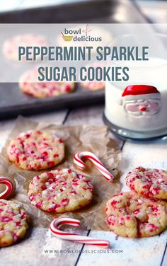 peppermint sparkle sugar cookies with candy canes in the foreground and a glass of milk in the background