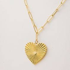 14k gold-filled paperclip necklace Accented with a “radiating” heart charm Necklace length: adjustable up to 16 inches or adjustable up to 18 inches Radiating Heart, Paperclip Heart, Radiate Love, Paperclip Necklace, Desired Reality, Heart Charm Necklace, Necklace Heart, Gold Heart Necklace, Jewelry Inspo