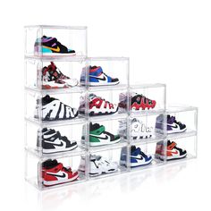 six clear acrylic boxes with various pairs of shoes in each one on the bottom