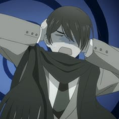 an anime character is holding his head with one hand and wearing a scarf around his neck