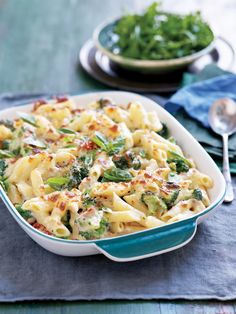 a casserole dish with broccoli and cheese