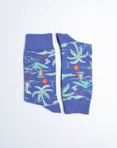 Providing the same feel of day relaxing or soaking up sun rays at the beach, these Beach Day Crew Socks serve as an ideal choice of footwear for any casual or vacation outing. The unique and vibrant pattern, depicting beach scenes such as waves, surfing, an umbrella and the sun, completes the look and makes a perfect casual sock for any beach our outdoor enthusiast. We all wish we could be at the beach at all times and these blue crew socks for men are the next best thing! Take your feet on a va Food Socks, Women Crew Socks, Blue Crew, Outdoor Enthusiast, Socks For Men, Men Beach, Funny Socks, Sun Rays, Colorful Socks