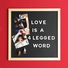 a black and white poster with the words love is a 4 legged word on it