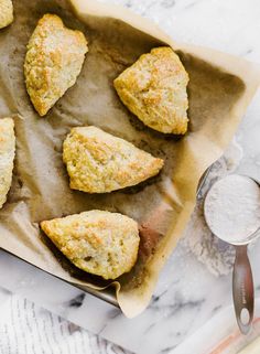 some food is laying out on a piece of parchment paper