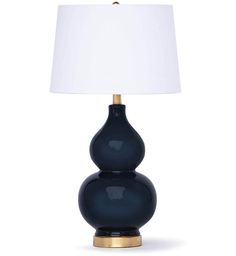 a blue lamp with a white shade on it