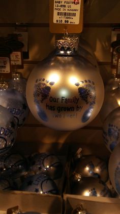 christmas ornaments are on display in a store