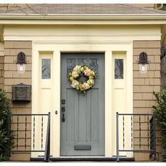 a house with a front door and a sign that says how it sold