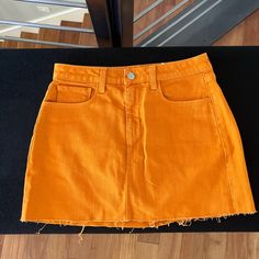 This L’gence Denim Mini Skirt Features 5-Pocket Styling, Raw Bottom Hem, And A Button And Zipper Closure. Size 25 Nwt - Sample Tag Tangerine Orange Color, Red Leather Mini Skirt, Skins Mini, Orange Skirt, Tweed Mini Skirt, Blue Tweed, Micro Mini Skirt, Jean Mini Skirts, Tie Dye Cotton