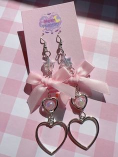 Adorable bow dangle earrings  🎀 Features stainless steel hooks and star charms ⸜(｡ ˃ ᵕ ˂ )⸝♡ 🎀 3" drop length 🎀 Stainless steel hooks 🎀 Follow @moonfactorydeco on ig for updates and new releases! 🎀 Questions? Message me and I'll be happy to help! Kawaii Silver Dangle Earrings, Silver Dangle Earrings In Kawaii Style, Kawaii Dangle Jewelry For Party, Earrings Y2k, Earrings Kawaii, Kawaii Earrings, Y2k Jewelry, Coquette Bow, Bow Earrings