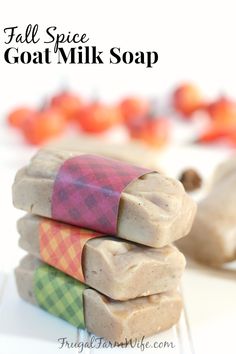 three soap bars stacked on top of each other with text overlay that reads fall spice goat milk soap