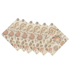 four napkins with floral designs on them, one in beige and the other in pink