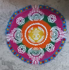 a colorful plate with an ornate design on it