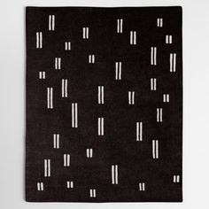 a black rug with white lines on it