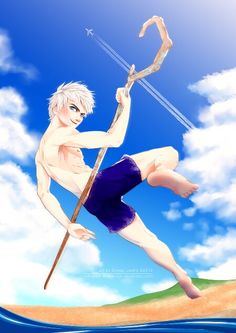 a man with white hair and blue shorts holding a stick in his hand while standing on the beach