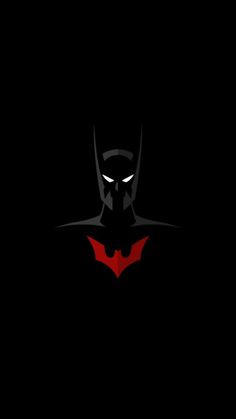 the dark knight batman logo with red eyes and fangs on it's face, in black