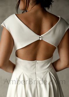 the back of a woman's wedding dress