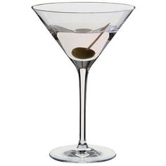 a martini glass with an olive in it