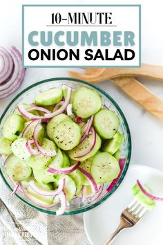 a bowl filled with cucumber onion salad on top of a table