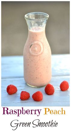 a pink smoothie in a glass bottle on a table