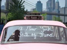 a pink car with the words a new york state of mind written on it's windshield