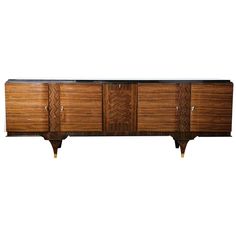 the sideboard is made out of wood and metal